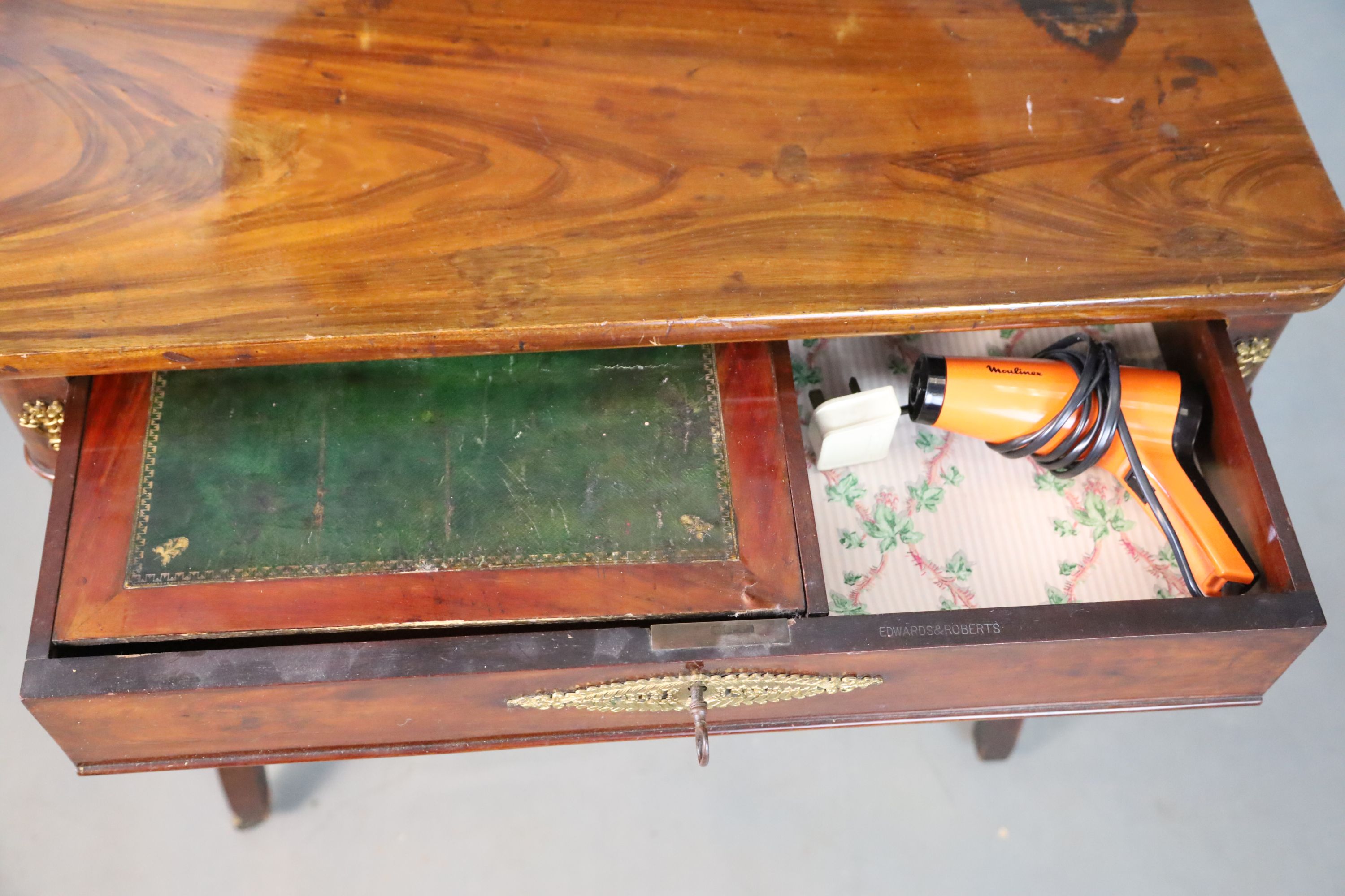 A Restauration gilt-bronze mounted mahogany dressing table, retailers stamp Edwards & Roberts, W.81.5cm D.42cm H.140cm